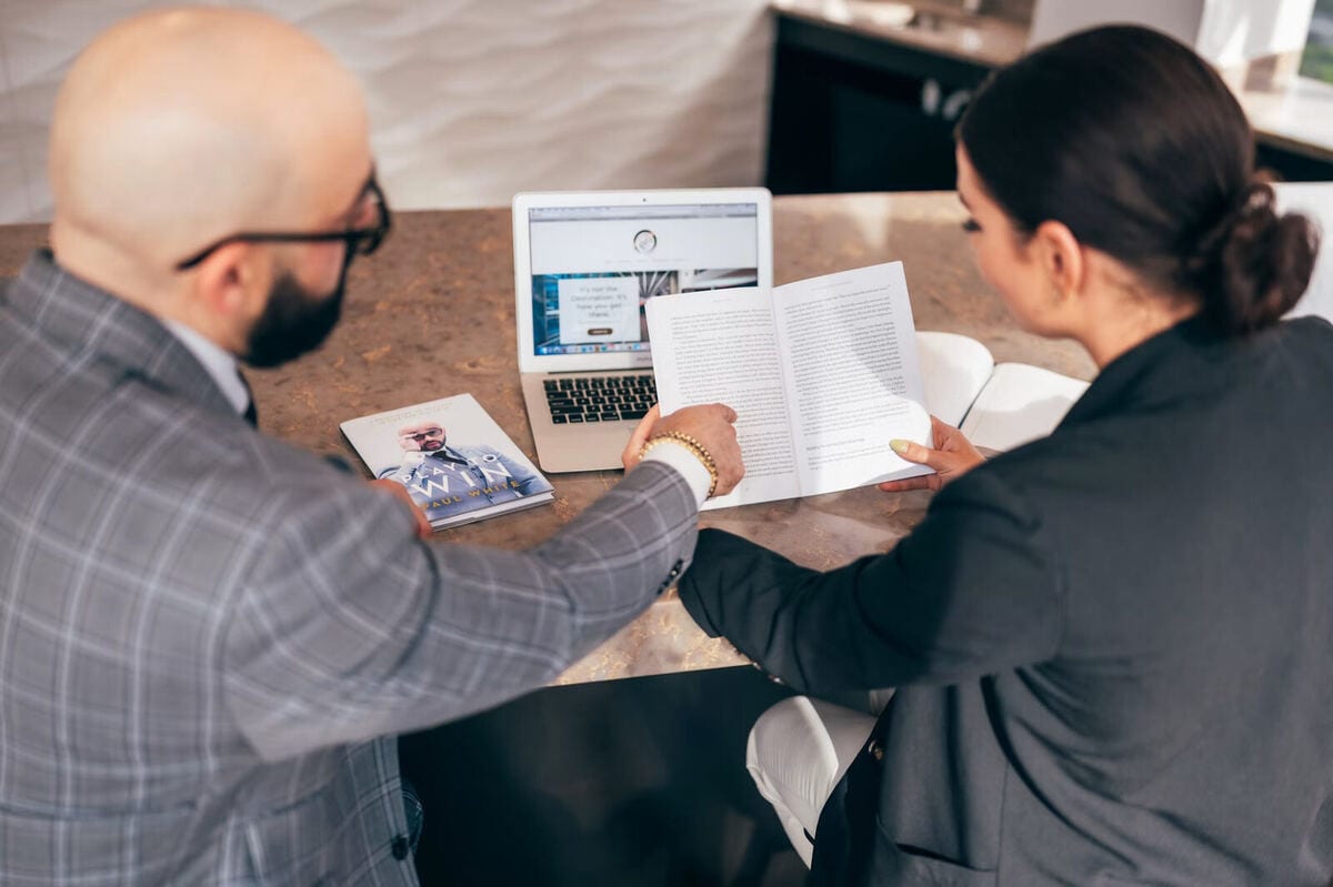 Mortgage broker meeting with a client