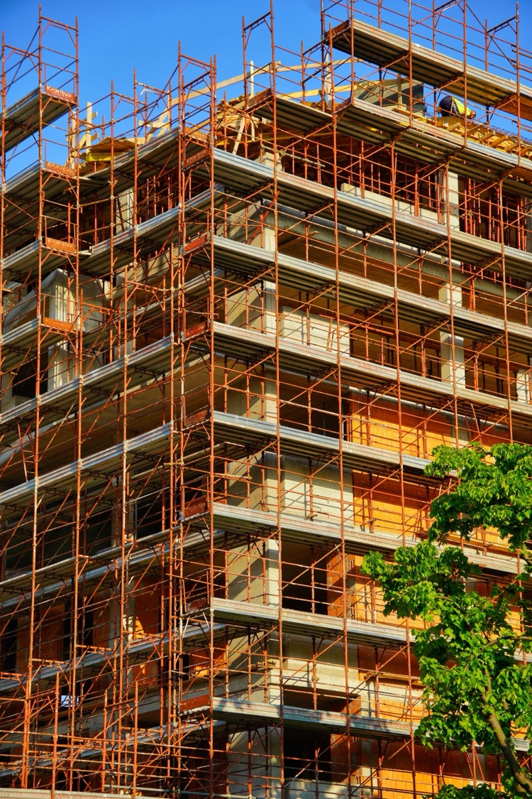 A building wrapped in scaffolding during a refurbishment project