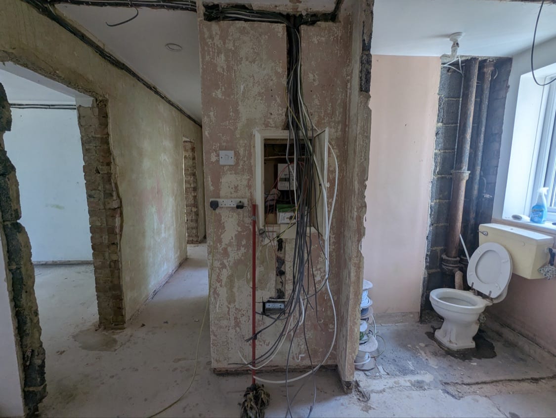 New consumer unit installed in the hallway at the Innes Gardens flat after the electrical rewire