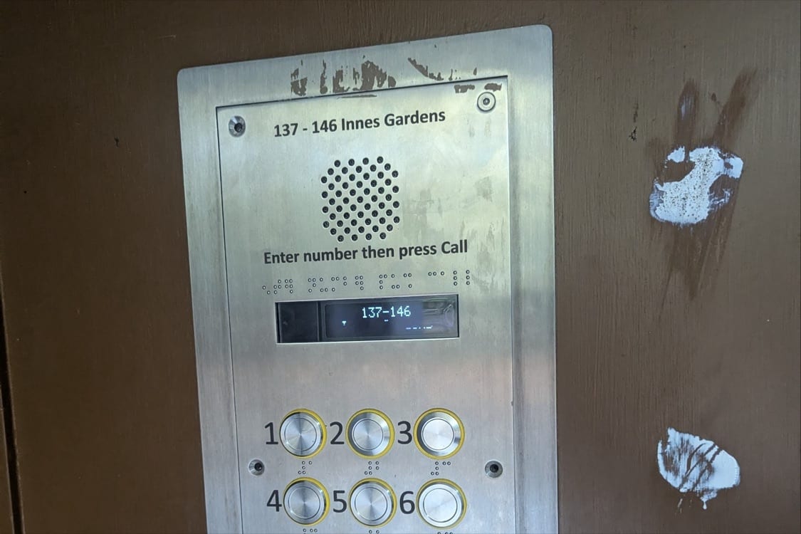 External communal intercom keypad panel, Entrotec brand, outside the Innes Gardens block