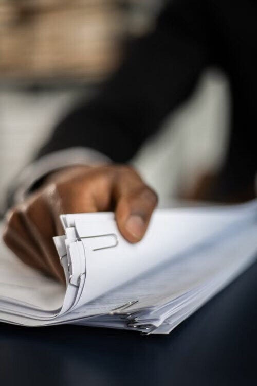 Conveyancing solicitor reviewing paperwork