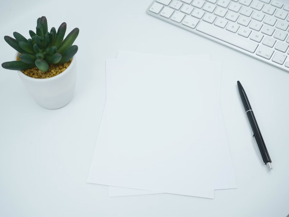 Lease documents and pen ready for a title split