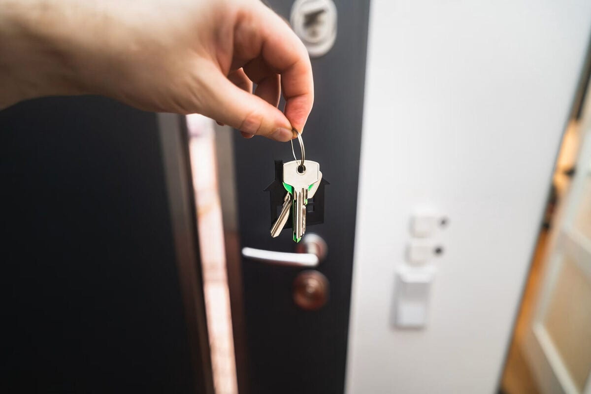 New homeowner receiving house keys