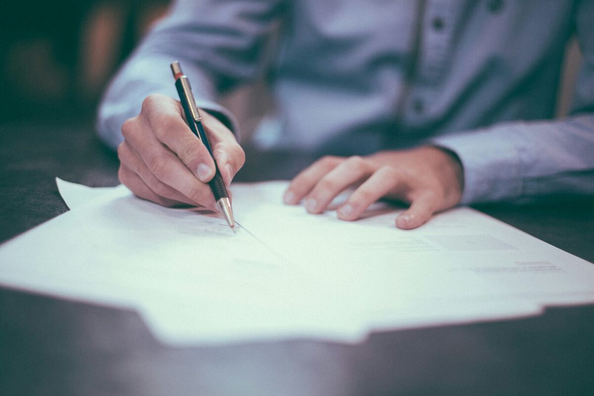 Solicitor signing contract documents