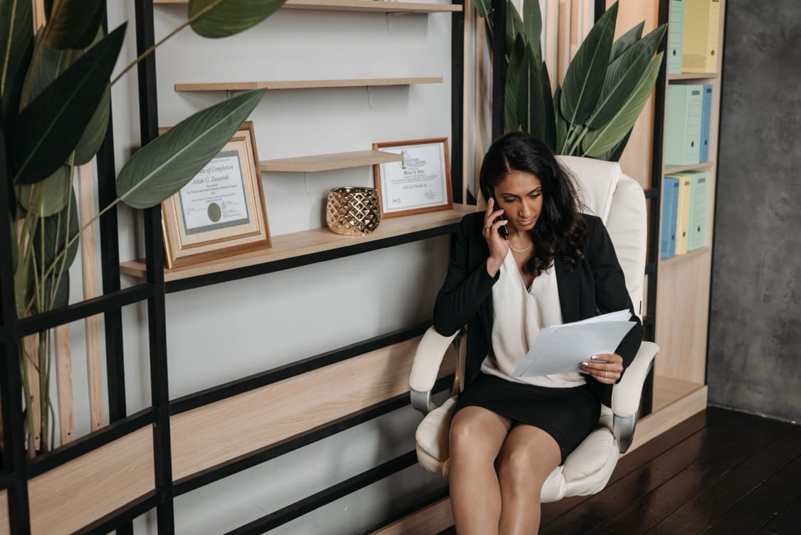 Reviewing tenancy documents during a phone call about a rented property